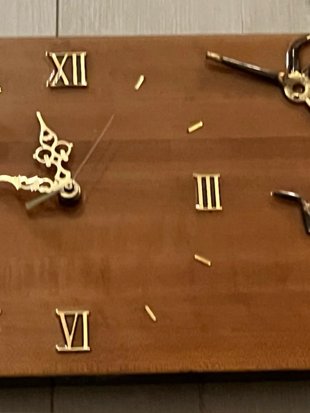 Brown Wood Wall Clock with Gold Metal toad runner